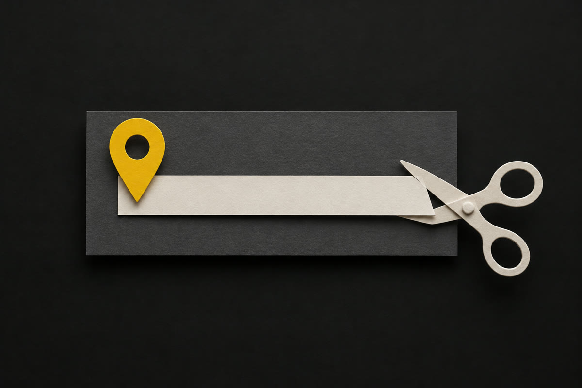 Illustration of a long paper label on charcoal with a yellow map pin at its start and scissors trimming its end.