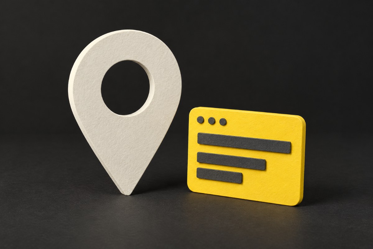 Illustration of a paper map pin on charcoal next to a yellow web page card.